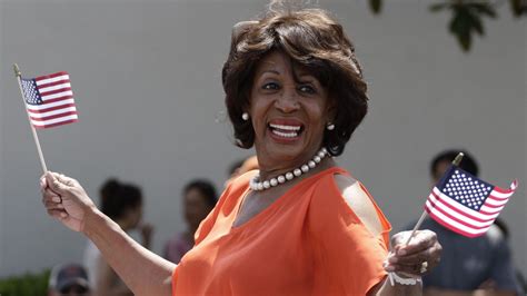 Maxine Waters waving the flag
